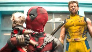 Deadpool holding Dogpool with Wolverine looking disgusted in the background during the movie Deadpool and Wolverine.